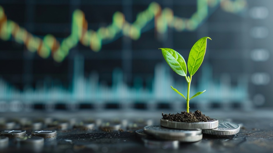 A series of stacked coins arranged in ascending height, with each stack topped by a small green tree, symbolizing financial growth and investment. The coins and trees form a bar graph, representing the concept of wealth accumulation and sustainable growth over time. The background is a soft, neutral gray.